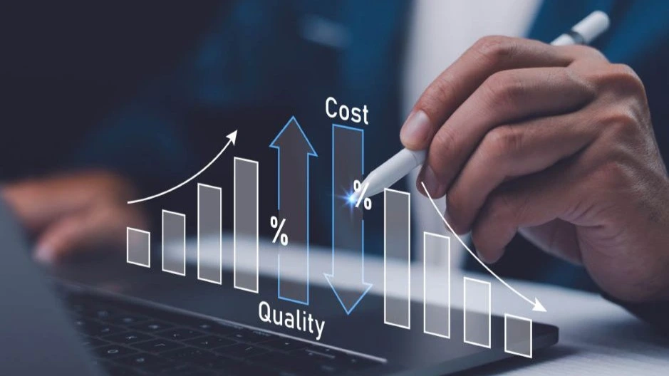 Digital holographic chart on a laptop showing rising costs and declining quality trends, with a hand pointing a stylus at the data.