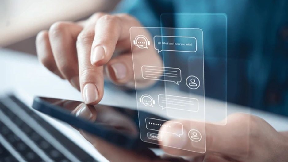 Person using mobile, chatting with AI bot - AI Chatbots uses NLP and Machine Learning