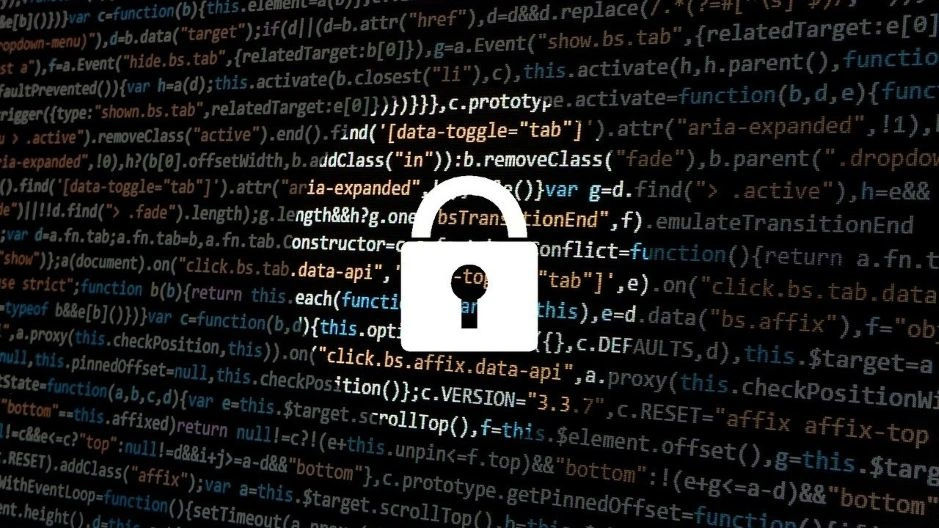 Cybersecurity lock icon over programming code representing PII redaction and data privacy in voice AI systems